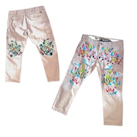 two pairs of pants with colorful designs on them