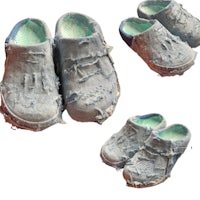 a pair of old clogs are shown on a white background