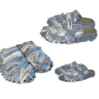 a pair of blue slippers with white paint on them